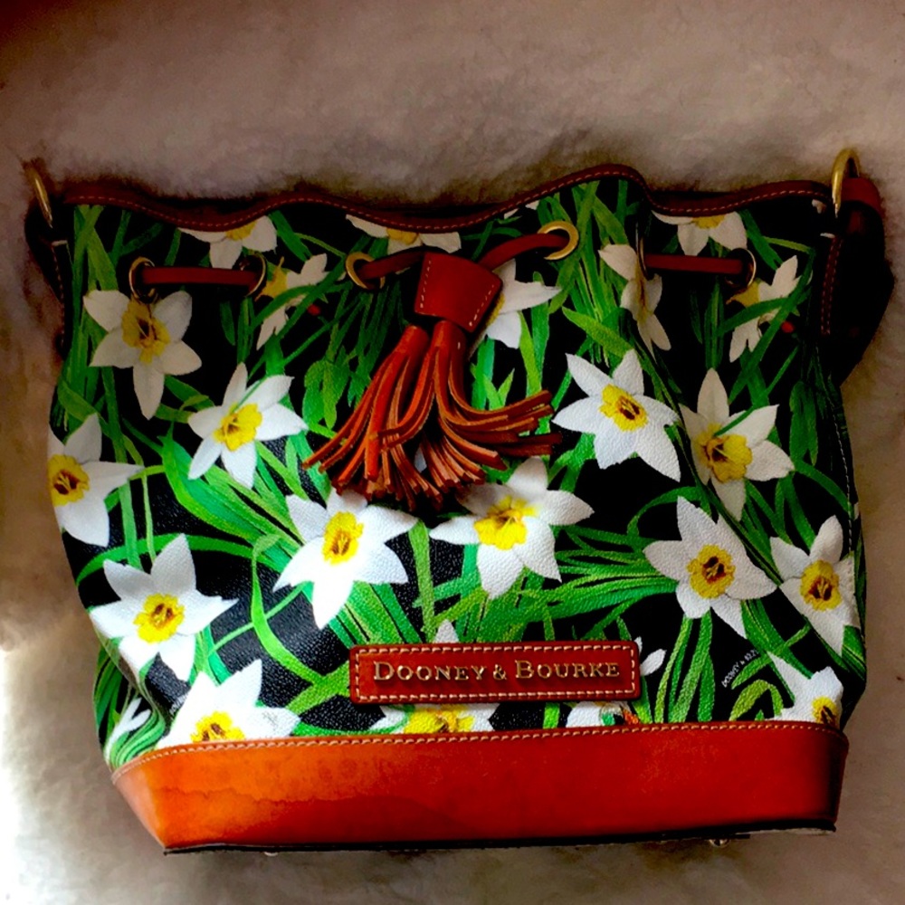 Dooney and Bourke bucket bag. Small water mark on left bottom